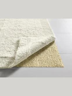 helline home Tapis<Sous-tapis dimension inférieure à celle du tapis d'environ 10 cm